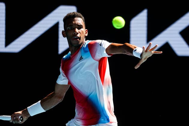 January 24, 2022: MELBOURNE, AUSTRALIA - JANUARY 24: Felix Auger-Aliassime of Canada on his way to beating Marin Cilic of Croatia on day 8 of the 2022 Australian Open at Melbourne Park on January 24, 2022 in Melbourne, Australia. - ZUMAp121 20220124_zsp_p121_050 Copyright: xChrisxPutnamx