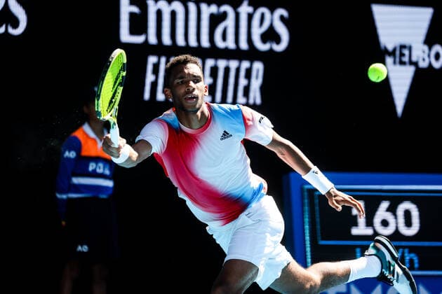 January 24, 2022, Melbourne, Victoria, Australia: MELBOURNE, AUSTRALIA - JANUARY 24: Felix Auger-Aliassime of Canada on his way to beating Marin Cilic of Croatia on day 8 of the 2022 Australian Open at Melbourne Park on January 24, 2022 in Melbourne, Australia. Melbourne Australia - ZUMAp121 20220124_zsp_p121_083 Copyright: xChrisxPutnamx