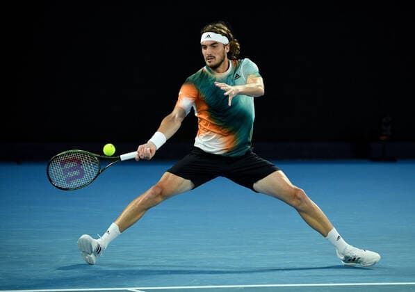 TENNIS AUSTRALIAN OPEN, Stefanos Tsitsipas of Greece in action during his 4th round singles match against Taylor Fritz of the USA on Day 8 of the Australian Open, at Melbourne Park, in Melbourne, Monday, January 24, 2022. ( NO ARCHIVING, EDITORIAL USE ONLY, NO USE IN BOOKS WITHOUT CONSENT MELBOURNE VIC AUSTRALIA  Copyright: xJAMESxROSSx 20220124001616570745