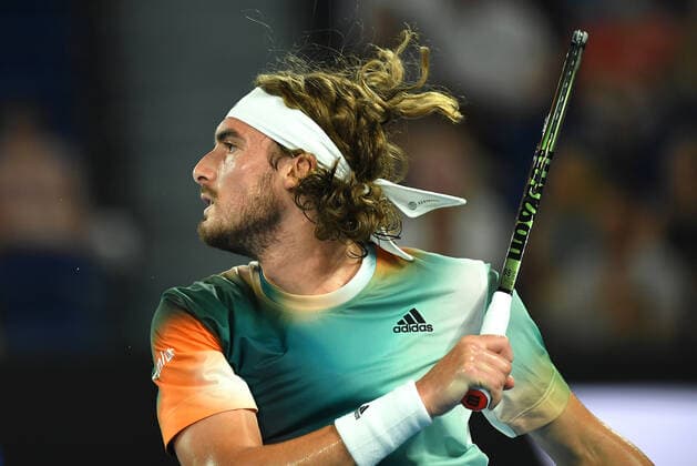 TENNIS AUSTRALIAN OPEN, Stefanos Tsitsipas of Greece in action during his 4th round singles match against Taylor Fritz of the USA on Day 8 of the Australian Open, at Melbourne Park, in Melbourne, Monday, January 24, 2022. ( NO ARCHIVING, EDITORIAL USE ONLY, NO USE IN BOOKS WITHOUT CONSENT MELBOURNE VIC AUSTRALIA  Copyright: xJAMESxROSSx 20220124001616571872