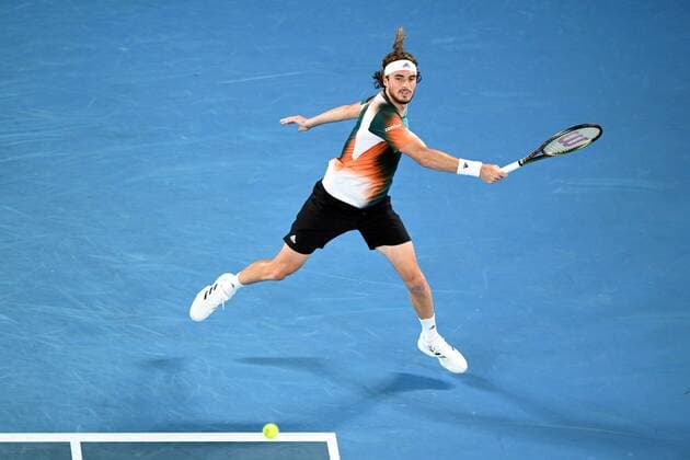 Mandatory Credit: Photo by James Gourley Shutterstock (12765100fw) Stefanos Tsitsipas during his fourth round match Australian Open, Day Eight, Tennis, Melbourne Park, Melbourne, Australia - 24 Jan 2022 Australian Open, Day Eight, Tennis, Melbourne Park, Melbourne, Australia - 24 Jan 2022 Copyright: xJamesxGourley Shutterstockx 12765100fw