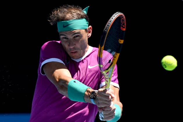 TENNIS AUSTRALIAN OPEN, Rafael Nadal of Spain plays a shot during his Men?s singles quarterfinal match against Denis Shapovalov of Canada on Day 9 of the Australian Open, at Melbourne Park, in Melbourne, Tuesday, January 25, 2022. ( NO ARCHIVING, EDITORIAL USE ONLY, NO USE IN BOOKS WITHOUT CONSENT MELBOURNE VIC AUSTRALIA  Copyright: xDEANxLEWINSx 20220125001616797432
