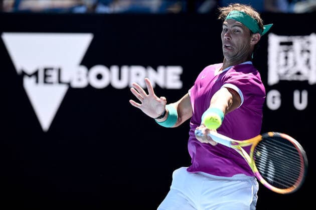 TENNIS AUSTRALIAN OPEN, Rafael Nadal of Spain plays a shot during his Men?s singles quarterfinal match against Denis Shapovalov of Canada on Day 9 of the Australian Open, at Melbourne Park, in Melbourne, Tuesday, January 25, 2022. ( NO ARCHIVING, EDITORIAL USE ONLY, NO USE IN BOOKS WITHOUT CONSENT MELBOURNE VIC AUSTRALIA  Copyright: xDEANxLEWINSx 20220125001616798807