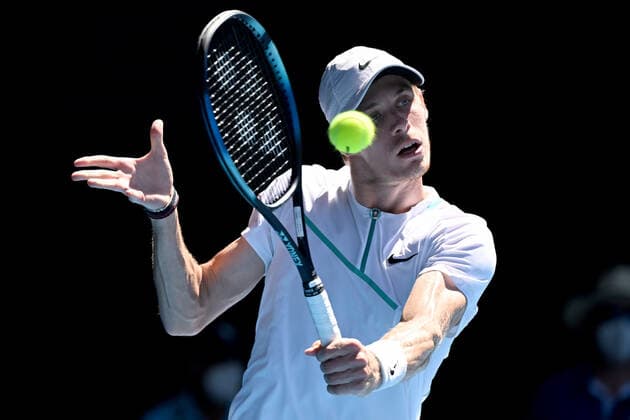 TENNIS AUSTRALIAN OPEN, Denis Shapovalov of Canada plays a shot during his Men?s singles quarterfinal match against Rafael Nadal of Spain on Day 9 of the Australian Open, at Melbourne Park, in Melbourne, Tuesday, January 25, 2022. ( NO ARCHIVING, EDITORIAL USE ONLY, NO USE IN BOOKS WITHOUT CONSENT MELBOURNE VIC AUSTRALIA  Copyright: xDEANxLEWINSx 20220125001616805389