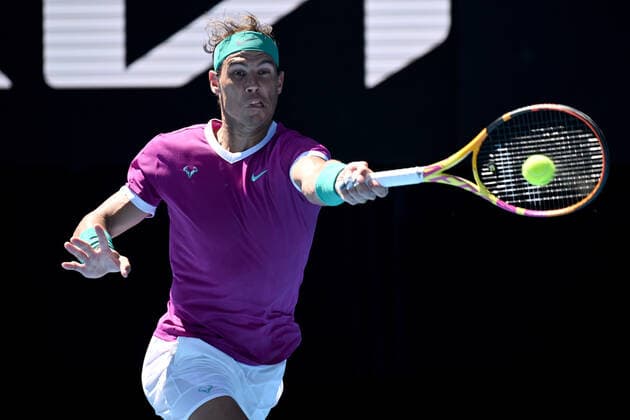 TENNIS AUSTRALIAN OPEN, Rafael Nadal of Spain plays a shot during his Men?s singles quarterfinal match against Denis Shapovalov of Canada on Day 9 of the Australian Open, at Melbourne Park, in Melbourne, Tuesday, January 25, 2022. ( NO ARCHIVING, EDITORIAL USE ONLY, NO USE IN BOOKS WITHOUT CONSENT MELBOURNE VIC AUSTRALIA  Copyright: xDEANxLEWINSx 20220125001616807331