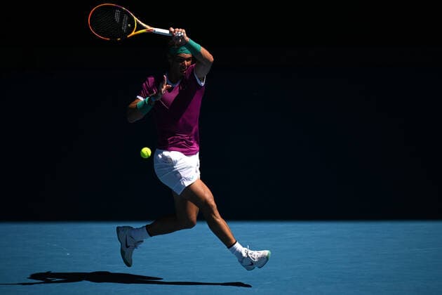 TENNIS AUSTRALIAN OPEN, Rafael Nadal of Spain plays a shot during his Men?s singles quarterfinal match against Denis Shapovalov of Canada on Day 9 of the Australian Open, at Melbourne Park, in Melbourne, Tuesday, January 25, 2022. ( NO ARCHIVING, EDITORIAL USE ONLY, NO USE IN BOOKS WITHOUT CONSENT MELBOURNE VIC AUSTRALIA  Copyright: xDEANxLEWINSx 20220125001616808616