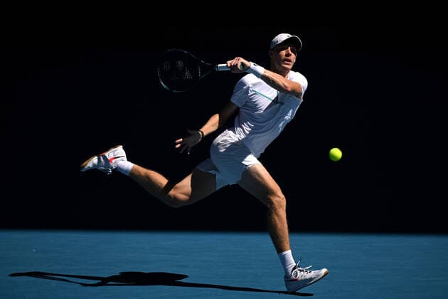 TENNIS AUSTRALIAN OPEN, Denis Shapovalov of Canada plays a shot during his Men?s singles quarterfinal match against Rafael Nadal of Spain on Day 9 of the Australian Open, at Melbourne Park, in Melbourne, Tuesday, January 25, 2022. ( NO ARCHIVING, EDITORIAL USE ONLY, NO USE IN BOOKS WITHOUT CONSENT MELBOURNE VIC AUSTRALIA  Copyright: xDEANxLEWINSx 20220125001616814530