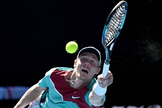 TENNIS AUSTRALIAN OPEN, Denis Shapovalov of Canada plays a shot during his Men?s singles quarterfinal match against Rafael Nadal of Spain on Day 9 of the Australian Open, at Melbourne Park, in Melbourne, Tuesday, January 25, 2022. ( NO ARCHIVING, EDITORIAL USE ONLY, NO USE IN BOOKS WITHOUT CONSENT MELBOURNE VIC AUSTRALIA  Copyright: xDEANxLEWINSx 20220125001616826498