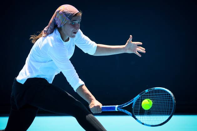 Iranian Meshkatolzahra Safi pictured in action during a second round game in the girls singles between Belgian Costoulas and Italian Safi at the Australian Open Grand Slam tennis tournament, Tuesday 25 January 2022 in Melbourne Park, Melbourne, Australia. The 2022 edition of the Australian Grand Slam takes place from January 17th to January 30th. PATRICKxHAMILTON  x5433677x