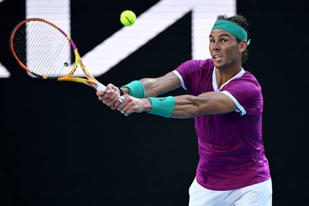TENNIS AUSTRALIAN OPEN, Rafael Nadal of Spain plays a shot during his Men?s singles quarterfinal match against Denis Shapovalov of Canada on Day 9 of the Australian Open, at Melbourne Park, in Melbourne, Tuesday, January 25, 2022. ( NO ARCHIVING, EDITORIAL USE ONLY, NO USE IN BOOKS WITHOUT CONSENT MELBOURNE VIC AUSTRALIA  Copyright: xDEANxLEWINSx 20220125001616854005