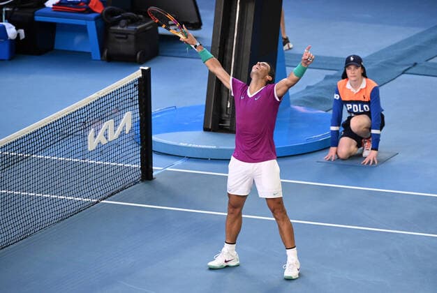 Mandatory Credit: Photo by James Gourley Shutterstock (12773752fe) Rafael Nadal celebrates victory in his quarter-final match Australian Open, Day Nine, Tennis, Melbourne Park, Melbourne, Australia - 25 Jan 2022 Australian Open, Day Nine, Tennis, Melbourne Park, Melbourne, Australia - 25 Jan 2022 Copyright: xJamesxGourley Shutterstockx 12773752fe