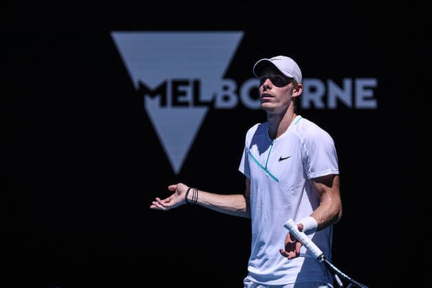 (220125) -- MELBOURNE, Jan. 25, 2022 -- Denis Shapovalov of Canada reacts during the men s singles quarterfinal match against Rafael Nadal of Spain at Australian Open in Melbourne, Australia, Jan. 25, 2022. ) (SP)AUSTRALIA-MELBOURNE-TENNIS-AUSTRALIAN OPEN-MEN S SINGLES BaixXuefei 