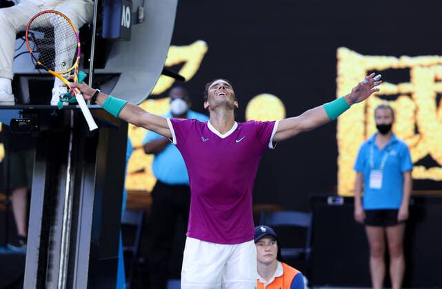 (220125) -- MELBOURNE, Jan. 25, 2022 -- Rafael Nadal of Spain celebrates after the men s singles quarterfinal match against Denis Shapovalov of Canada at Australian Open in Melbourne, Australia, Jan. 25, 2022. ) (SP)AUSTRALIA-MELBOURNE-TENNIS-AUSTRALIAN OPEN-MEN S SINGLES BaixXuefei 