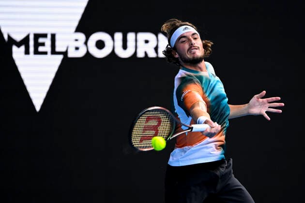 TENNIS AUSTRALIAN OPEN, Stefanos Tsitsipas of Greece plays a shot during his Men?s quarterfinal match against Jannik Sinner of Italy on Day 10 of the Australian Open, at Melbourne Park, in Melbourne, Wednesday, January 26, 2022. ( NO ARCHIVING, EDITORIAL USE ONLY, NO USE IN BOOKS WITHOUT CONSENT MELBOURNE VIC AUSTRALIA  Copyright: xDAVExHUNTx 20220126001617228170