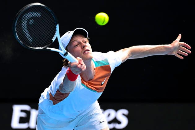 TENNIS AUSTRALIAN OPEN, Jannik Sinner of Italy plays a shot during his Men?s quarterfinal match against Stefanos Tsitsipas of Greece on Day 10 of the Australian Open, at Melbourne Park, in Melbourne, Wednesday, January 26, 2022. ( NO ARCHIVING, EDITORIAL USE ONLY, NO USE IN BOOKS WITHOUT CONSENT MELBOURNE VIC AUSTRALIA  Copyright: xDAVExHUNTx 20220126001617232952