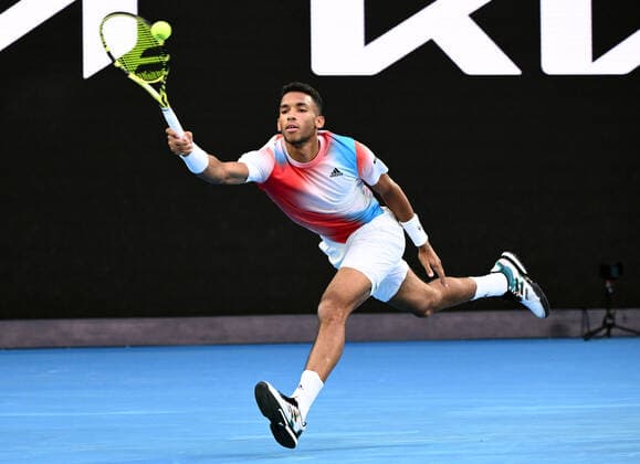 Mandatory Credit: Photo by James Gourley Shutterstock (12773754dp) Felix Auger-Aliassime during his quarter final match Australian Open, Day Ten, Tennis, Melbourne Park, Melbourne, Australia - 26 Jan 2022 Australian Open, Day Ten, Tennis, Melbourne Park, Melbourne, Australia - 26 Jan 2022 Copyright: xJamesxGourley Shutterstockx 12773754dp