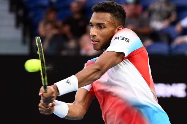 Mandatory Credit: Photo by James Gourley Shutterstock (12773754dr) Felix Auger-Aliassime during his quarter final match Australian Open, Day Ten, Tennis, Melbourne Park, Melbourne, Australia - 26 Jan 2022 Australian Open, Day Ten, Tennis, Melbourne Park, Melbourne, Australia - 26 Jan 2022 Copyright: xJamesxGourley Shutterstockx 12773754dr