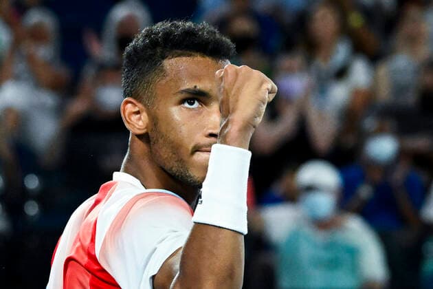 TENNIS AUSTRALIAN OPEN, Felix Auger-Aliassime of Canada celebrates winning the second set during his Men?s quarterfinal match against Daniil Medvedev of Russia on Day 10 of the Australian Open, at Melbourne Park, in Melbourne, Wednesday, January 26, 2022. ( NO ARCHIVING, EDITORIAL USE ONLY, NO USE IN BOOKS WITHOUT CONSENT MELBOURNE VIC AUSTRALIA  Copyright: xDEANxLEWINSx 20220126001617262085