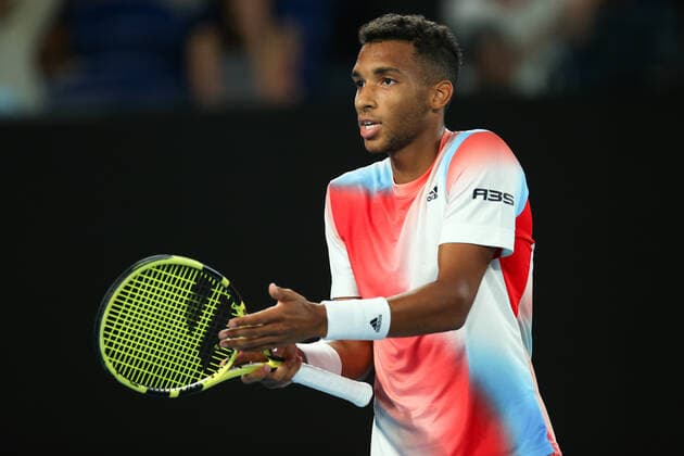 Mandatory Credit: Photo by Ella Ling Shutterstock (12773755ep) Felix Auger-Aliassime during his quarter final match Australian Open, Day Ten, Tennis, Melbourne Park, Melbourne, Australia - 26 Jan 2022 Australian Open, Day Ten, Tennis, Melbourne Park, Melbourne, Australia - 26 Jan 2022 Copyright: xEllaxLing Shutterstockx 12773755ep