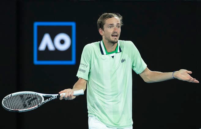 (220126) -- MELBOURNE, Jan. 26, 2022 -- Daniil Medvedev of Russia reacts during the men s single match between Felix Auger-Aliassime of Canada and Daniil Medvedev of Russia at Australian Open in Melbourne Park, in Melbourne, Australia, on Jan. 26, 2022. ) (SP)AUSTRALIA-MELBOURNE-TENNIS-AUSTRALIAN OPEN-MEN S SINGLES-QUARTERFINALS BaixXuefei 