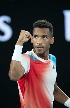 (220126) -- MELBOURNE, Jan. 26, 2022 -- Felix Auger-Aliassime of Canada celebrates during the men s single match between Felix Auger-Aliassime of Canada and Daniil Medvedev of Russia at Australian Open in Melbourne Park, in Melbourne, Australia, on Jan. 26, 2022. ) (SP)AUSTRALIA-MELBOURNE-TENNIS-AUSTRALIAN OPEN-MEN S SINGLES-QUARTERFINALS BaixXuefei 
