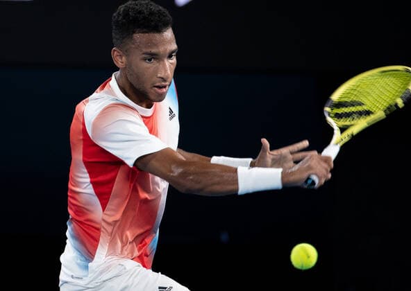 (220126) -- MELBOURNE, Jan. 26, 2022 -- Felix Auger-Aliassime of Canada competes during the men s single match between Felix Auger-Aliassime of Canada and Daniil Medvedev of Russia at Australian Open in Melbourne Park, in Melbourne, Australia, on Jan. 26, 2022. (Photo by Xinhua) (SP)AUSTRALIA-MELBOURNE-TENNIS-AUSTRALIAN OPEN-MEN S SINGLES-QUARTERFINALS HuxJingchen 