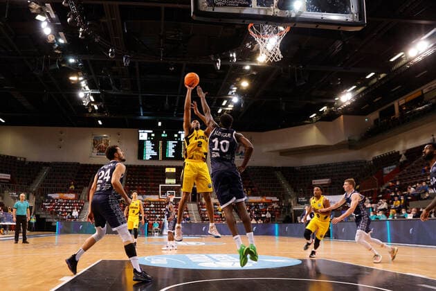 Ludwigsburg , Basketball Champions League MHP Riesen Ludwigsburg vs JDA Dijon , from left Charles Galliou Dijon Jacob Patrick Riesen Jaques Alingue Dijon