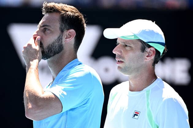 TENNIS AUSTRALIAN OPEN, Marcel Granollers of Spain (left) and Horacio Zeballos of Argentina during their Men?s doubles semifinal match against Nick Kyrgios and Thanasi Kokkinakis of Australia on Day 11 of the Australian Open, at Melbourne Park, in Melbourne, Thursday, January 27, 2022. ( NO ARCHIVING, EDITORIAL USE ONLY, NO USE IN BOOKS WITHOUT CONSENT MELBOURNE VIC AUSTRALIA  Copyright: xDAVExHUNTx 20220127001617511910