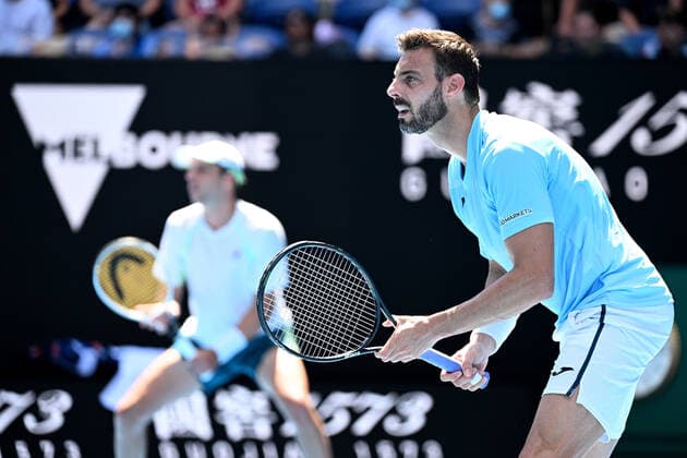 TENNIS AUSTRALIAN OPEN, Marcel Granollers of Spain (right) and Horacio Zeballos of Argentina during their Men?s doubles semifinal match against Nick Kyrgios and Thanasi Kokkinakis of Australia on Day 11 of the Australian Open, at Melbourne Park, in Melbourne, Thursday, January 27, 2022. ( NO ARCHIVING, EDITORIAL USE ONLY, NO USE IN BOOKS WITHOUT CONSENT MELBOURNE VIC AUSTRALIA  Copyright: xDAVExHUNTx 20220127001617512464