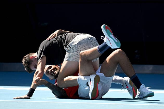 TENNIS AUSTRALIAN OPEN, Nick Kyrgios and Thanasi Kokkinakis of Australia celebrate after winning their Men?s doubles semifinal match against Marcel Granollers of Spain and Horacio Zeballos of Argentina on Day 11 of the Australian Open, at Melbourne Park, in Melbourne, Thursday, January 27, 2022. ( NO ARCHIVING, EDITORIAL USE ONLY, NO USE IN BOOKS WITHOUT CONSENT MELBOURNE VIC AUSTRALIA  Copyright: xDEANxLEWINSx 20220127001617515651