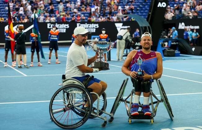 Mandatory Credit: Photo by Ella Ling Shutterstock (12773761bx) Dylan Alcott poses with his runners up trophy in his final competitive match alongside Sam Schroder Australian Open, Day Eleven, Tennis, Melbourne Park, Melbourne, Australia - 27 Jan 2022 Australian Open, Day Eleven, Tennis, Melbourne Park, Melbourne, Australia - 27 Jan 2022 Copyright: xEllaxLing Shutterstockx 12773761bx