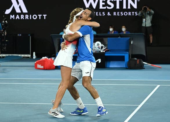 TENNIS AUSTRALIAN OPEN, Ivan Dodig of Croatia and Kristina Mladenovic of France react after winning their Mixed Doubles Final against Jaimee Fourlis and Jason Kubler of Australia on Day 12 of the Australian Open, at Melbourne Park, in Melbourne, Friday, January 28, 2022. ( NO ARCHIVING, EDITORIAL USE ONLY, NO USE IN BOOKS WITHOUT CONSENT MELBOURNE VIC AUSTRALIA  Copyright: xDEANxLEWINSx 20220128001617766386