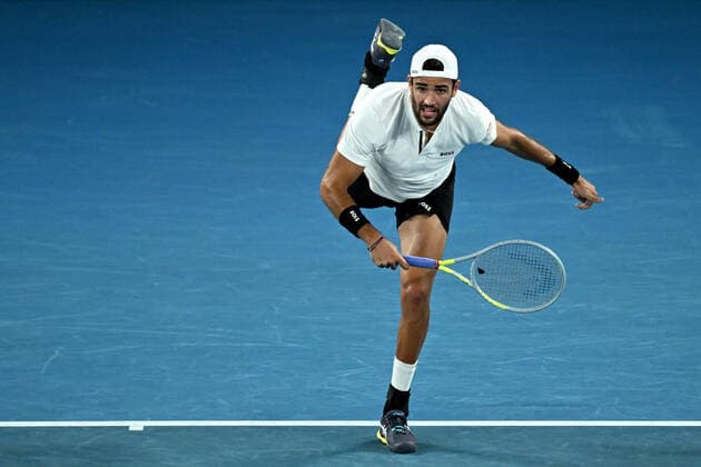 TENNIS AUSTRALIAN OPEN, Matteo Berrettini of Italy serves during his Men?s semifinal match against Rafael Nadal of Spain on Day 12 of the Australian Open, at Melbourne Park, in Melbourne, Friday, January 28, 2022. ( NO ARCHIVING, EDITORIAL USE ONLY, NO USE IN BOOKS WITHOUT CONSENT MELBOURNE VIC AUSTRALIA  Copyright: xDEANxLEWINSx 20220128001617775739
