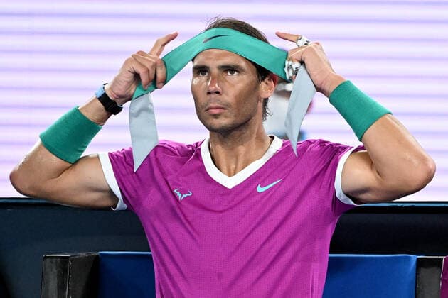 TENNIS AUSTRALIAN OPEN, Rafael Nadal of Spain adjusts his headband during his Men?s semifinal match against Matteo Berrettini of Italy on Day 12 of the Australian Open, at Melbourne Park, in Melbourne, Friday, January 28, 2022. ( NO ARCHIVING, EDITORIAL USE ONLY, NO USE IN BOOKS WITHOUT CONSENT MELBOURNE VIC AUSTRALIA  Copyright: xDAVExHUNTx 20220128001617778821