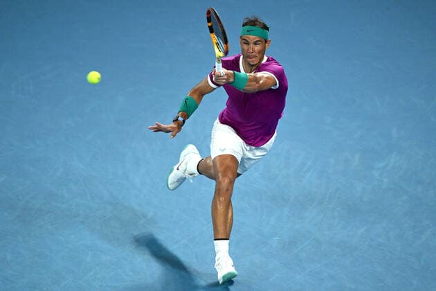TENNIS AUSTRALIAN OPEN, Rafael Nadal of Spain plays a shot during his Men?s semifinal match against Matteo Berrettini of Italy on Day 12 of the Australian Open, at Melbourne Park, in Melbourne, Friday, January 28, 2022. ( NO ARCHIVING, EDITORIAL USE ONLY, NO USE IN BOOKS WITHOUT CONSENT MELBOURNE VIC AUSTRALIA  Copyright: xDEANxLEWINSx 20220128001617779303