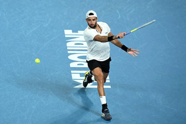 TENNIS AUSTRALIAN OPEN, Matteo Berrettini of Italy plays a shot during his Men?s semifinal match against Rafael Nadal of Spain on Day 12 of the Australian Open, at Melbourne Park, in Melbourne, Friday, January 28, 2022. ( NO ARCHIVING, EDITORIAL USE ONLY, NO USE IN BOOKS WITHOUT CONSENT MELBOURNE VIC AUSTRALIA  Copyright: xDEANxLEWINSx 20220128001617793372