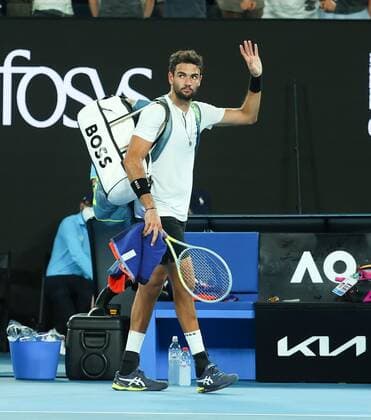 Mandatory Credit: Photo by Ella Ling Shutterstock (12775251y) Matteo Berrettini waves to the crowd after defeat Australian Open, Day Twelve, Tennis, Melbourne Park, Melbourne, Australia - 28 Jan 2022 Australian Open, Day Twelve, Tennis, Melbourne Park, Melbourne, Australia - 28 Jan 2022 Copyright: xEllaxLing Shutterstockx 12775251y