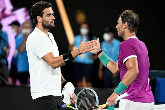 TENNIS AUSTRALIAN OPEN, Rafael Nadal of Spain (right) meets Matteo Berrettini of Italy at the net after winning their Men?s semifinal match on Day 12 of the Australian Open, at Melbourne Park, in Melbourne, Friday, January 28, 2022. ( NO ARCHIVING, EDITORIAL USE ONLY, NO USE IN BOOKS WITHOUT CONSENT MELBOURNE VIC AUSTRALIA  Copyright: xDAVExHUNTx 20220128001617798449