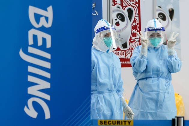 BEIJING, CHINA - JANUARY 28, 2022: Employees are at work at a COVID-19 testing area of Beijing Capital International Airport ahead of the 2022 Winter Olympics. The 24th Winter Olympic Games, Olympische Spiele, Olympia, OS are scheduled to take place in Beijing on February 4-20, 2022. Sergei Bobylev TASS  TS1206C1