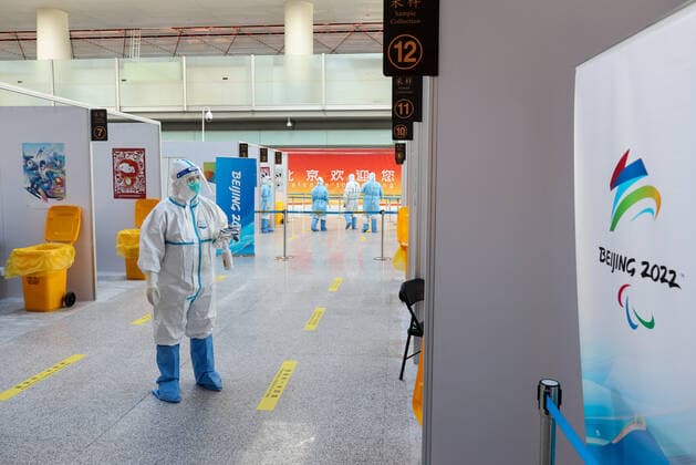 BEIJING, CHINA - JANUARY 28, 2022: Employees are at work at a COVID-19 testing area of Beijing Capital International Airport ahead of the 2022 Winter Olympics. The 24th Winter Olympic Games, Olympische Spiele, Olympia, OS are scheduled to take place in Beijing on February 4-20, 2022. Sergei Bobylev TASS  TS1206C5