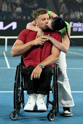 TENNIS AUSTRALIAN OPEN, Australian of the Year Dylan Alcott and his partner Chantell Otten during a presentation following Alcott?s retirement from competitive tennis, on Day 12 of the Australian Open, at Melbourne Park, in Melbourne, Friday, January 28, 2022. ( NO ARCHIVING, EDITORIAL USE ONLY, NO USE IN BOOKS WITHOUT CONSENT MELBOURNE VIC AUSTRALIA  Copyright: xDAVExHUNTx 20220128001617806138