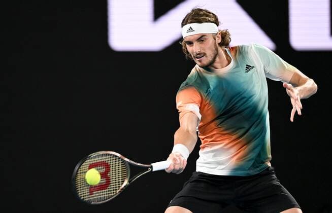 Mandatory Credit: Photo by James Gourley Shutterstock (12775245cz) Stefanos Tsitsipas in semi final action Australian Open, Day Twelve, Tennis, Melbourne Park, Melbourne, Australia - 28 Jan 2022 Australian Open, Day Twelve, Tennis, Melbourne Park, Melbourne, Australia - 28 Jan 2022 Copyright: xJamesxGourley Shutterstockx 12775245cz