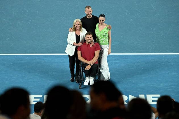 TENNIS AUSTRALIAN OPEN, Australian of the Year Dylan Alcott (centre) along with his mother Resie (left) brother Zack and partner Chantell Otten during a presentation following Alcott?s retirement from competitive tennis, on Day 12 of the Australian Open, at Melbourne Park, in Melbourne, Friday, January 28, 2022. ( NO ARCHIVING, EDITORIAL USE ONLY, NO USE IN BOOKS WITHOUT CONSENT MELBOURNE VIC AUSTRALIA  Copyright: xDEANxLEWINSx 20220128001617807855
