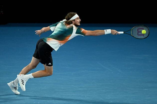 TENNIS AUSTRALIAN OPEN, Stefanos Tsitsipas of Greece plays a shot during his Men?s semifinal match against Daniil Medvedev of Russia on Day 12 of the Australian Open, at Melbourne Park, in Melbourne, Friday, January 28, 2022. ( NO ARCHIVING, EDITORIAL USE ONLY, NO USE IN BOOKS WITHOUT CONSENT MELBOURNE VIC AUSTRALIA  Copyright: xDEANxLEWINSx 20220128001617808434