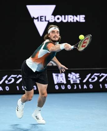 Mandatory Credit: Photo by James Gourley Shutterstock (12775245dg) Stefanos Tsitsipas in semi final action Australian Open, Day Twelve, Tennis, Melbourne Park, Melbourne, Australia - 28 Jan 2022 Australian Open, Day Twelve, Tennis, Melbourne Park, Melbourne, Australia - 28 Jan 2022 Copyright: xJamesxGourley Shutterstockx 12775245dg