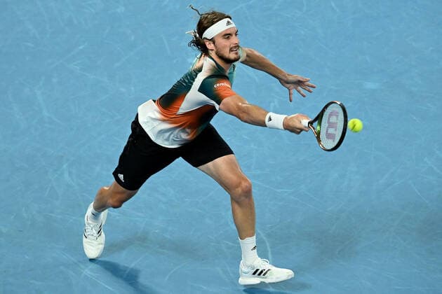 TENNIS AUSTRALIAN OPEN, Stefanos Tsitsipas of Greece plays a shot during his Men?s semifinal match against Daniil Medvedev of Russia on Day 12 of the Australian Open, at Melbourne Park, in Melbourne, Friday, January 28, 2022. ( NO ARCHIVING, EDITORIAL USE ONLY, NO USE IN BOOKS WITHOUT CONSENT MELBOURNE VIC AUSTRALIA  Copyright: xDEANxLEWINSx 20220128001617811196