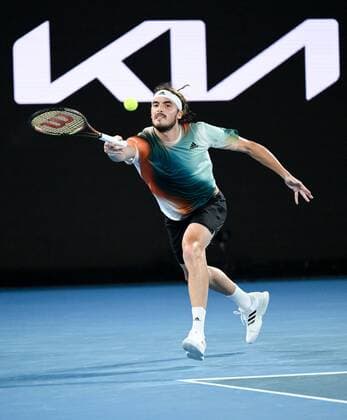 Mandatory Credit: Photo by James Gourley Shutterstock (12775245dy) Stefanos Tsitsipas in semi final action Australian Open, Day Twelve, Tennis, Melbourne Park, Melbourne, Australia - 28 Jan 2022 Australian Open, Day Twelve, Tennis, Melbourne Park, Melbourne, Australia - 28 Jan 2022 Copyright: xJamesxGourley Shutterstockx 12775245dy