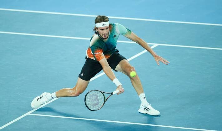 Mandatory Credit: Photo by Ella Ling Shutterstock (12775251cv) Stefanos Tsitsipas in semi final action Australian Open, Day Twelve, Tennis, Melbourne Park, Melbourne, Australia - 28 Jan 2022 Australian Open, Day Twelve, Tennis, Melbourne Park, Melbourne, Australia - 28 Jan 2022 Copyright: xEllaxLing Shutterstockx 12775251cv
