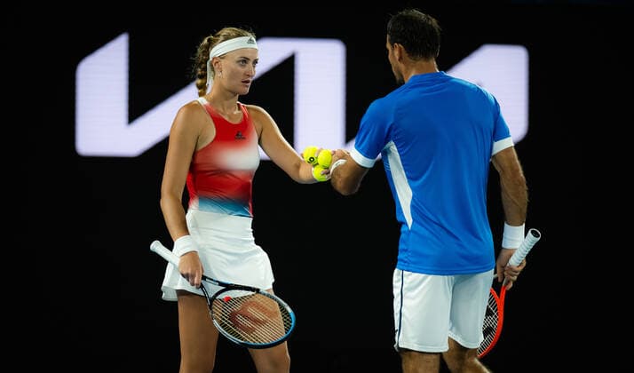 January 28, 2022, MELBOURNE, AUSTRALIA: Kristina Mladenovic of France in action during the mixed doubles final with partner Ivan Dodig at the 2022 Australian Open Grand Slam Tennis Tournament MELBOURNE AUSTRALIA - ZUMAa181 20220128_zaa_a181_004 Copyright: xRobxPrangex
