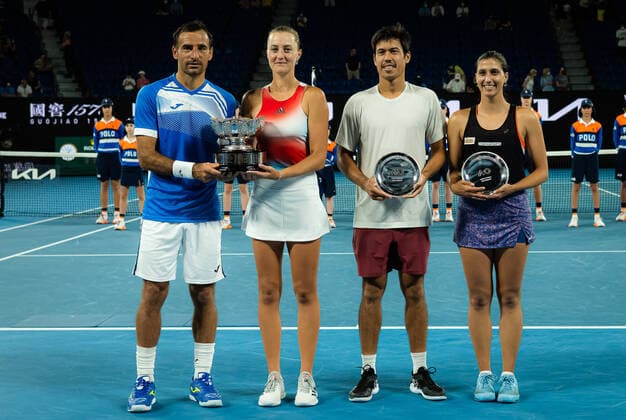 January 28, 2022, MELBOURNE, AUSTRALIA: Ivan Dodig of Croatia & Kristina Mladenovic of France and Jason Kubler of Australia & Jaimee Fourlis of Australia pose with their trophies after the mixed doubles final of the 2022 Australian Open Grand Slam Tennis Tournament MELBOURNE AUSTRALIA - ZUMAa181 20220128_zaa_a181_012 Copyright: xRobxPrangex